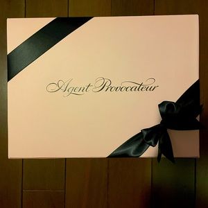 New with tags. Agent Provocateur 2-piece bra and panties set. Beautiful!